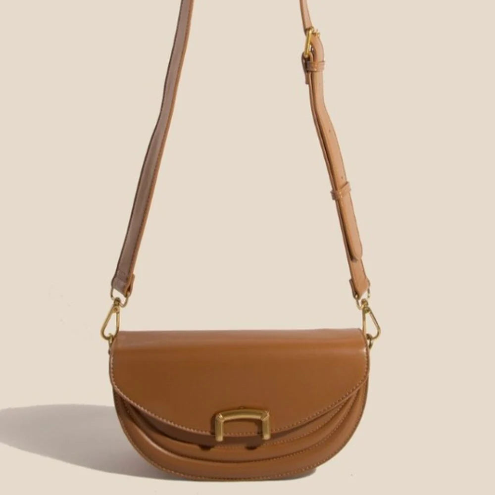 Buckle Half Moon Crossbody Bag by Madison West