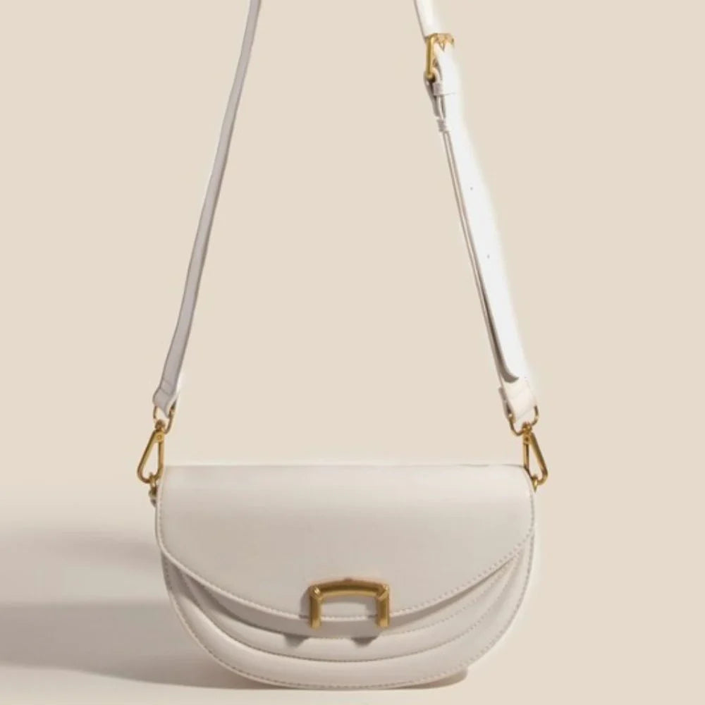 Buckle Half Moon Crossbody Bag by Madison West